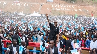 Rwanda’s President Paul Kagame greets a crowd of supporters