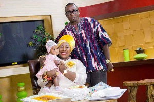 Gifty Anti with husband and daughter