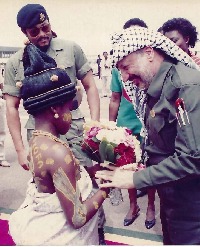 A picture showing JJ Rawlings and Yasser Arafat standing at the airport