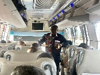 Ambassador Edward Boateng, Director General of SIGA interacting with others during the journey