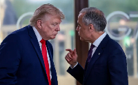 US President Donald Trump speaks with Canadian Prime Minister Mark Carney at a working lunch