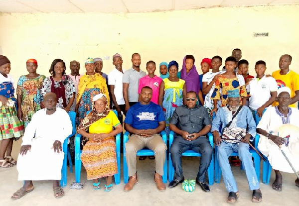 Rt Hon James Baba Anabiga in a photo with stakeholders