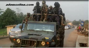 File Photo: Military men deployed to a town.