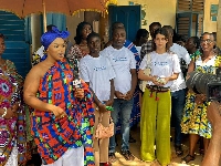 Nana Nyarkoah Aboraa Sika III and her team during the donation