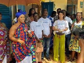 Nana Nyarkoah Aboraa Sika III and her team during the donation