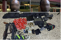 The police seized guns, bullets, and other items from the hideout of the suspects