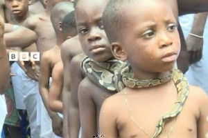 Kids with snakes around their necks