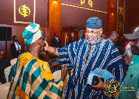 Alhaji Said Sinare (R) interacting with the NDC National Chairman Asiedu Nketiah