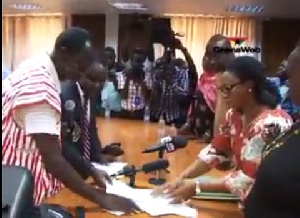 PPP Chairman, Nii Allotey Brew Hammond, presents nomination forms on behalf of Dr. Nduom to EC Chair