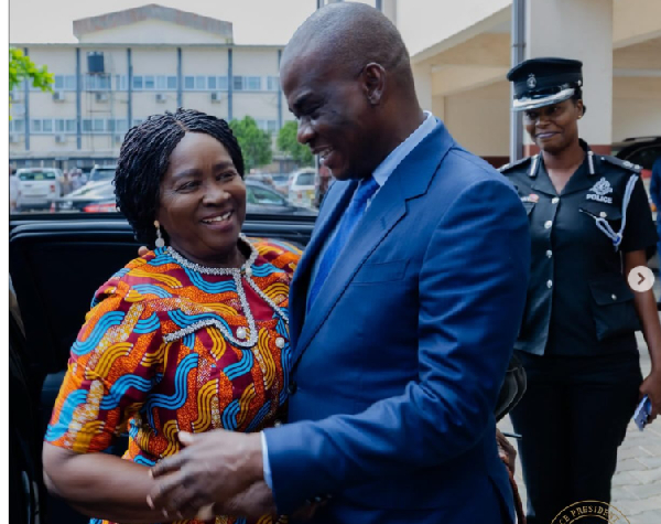 Vice President Naana Jane Opoku-Agyemang (L) and Haruna Iddrisu (R) hugging during Naana's visit