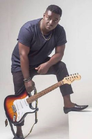 Nana Yaw Kumi popularly known as  Kumi Guitar