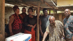 Hon. Dzifa Gomashie with family of late Solomon Sampah