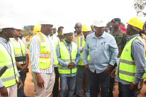 President Mahama in a chat with road contractors