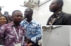 Ballistic Expert Cudjoe (r) showing the bullet mark on the Bongo Frontier Pickup