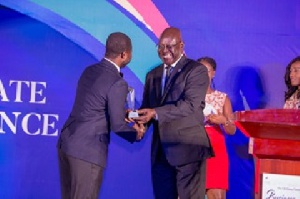 Booomers receiving SME of the Year Award in Ghana