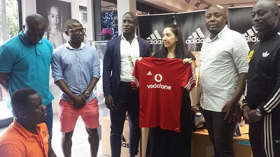 Stephen Appiah with his team at the Adidas office