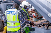 The police is seen inpecting a vehicle