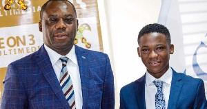 Young Ghanaian Hollywood actor Abraham Attah with Dr. Mathew Opoku Prempeh