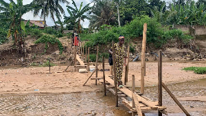 A resident using the footbridge