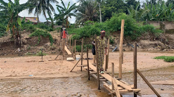 A resident using the footbridge