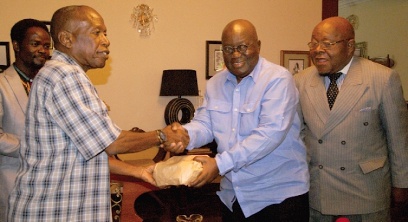 Nana Addo making the presentation to Rev Osei Kofi