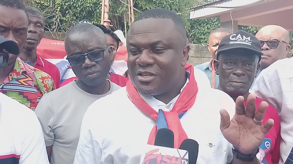 Collins Adomako Mensah speaking to the media after filing his nomination