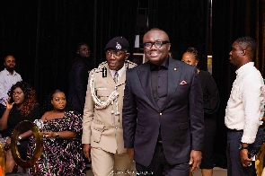 Bola Ray in a pose with the Inspector General of Police Dr George Akuffo Dampare
