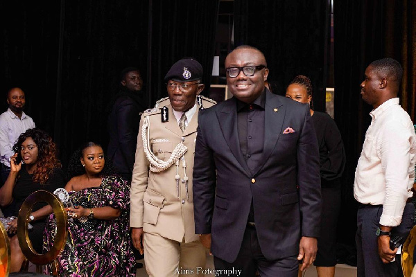Bola Ray in a pose with the Inspector General of Police Dr George Akuffo Dampare