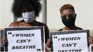 Activists, wearing masks to protect themselves from the coronavirus, protest in SA, June 2020 Activists, wearing masks to protect themselves from the coronavirus, protest in SA, June 2020