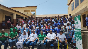 Some executives of the association and school students in Adabraka