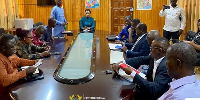 Eastern Regional Minister Rita Awatey in a meeting with officials of the RCC