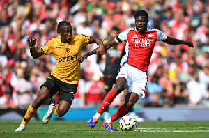 Thomas Partey (controlling the ball)