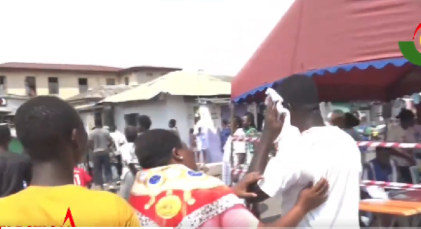 The injured man in white shirt seen covering the injury