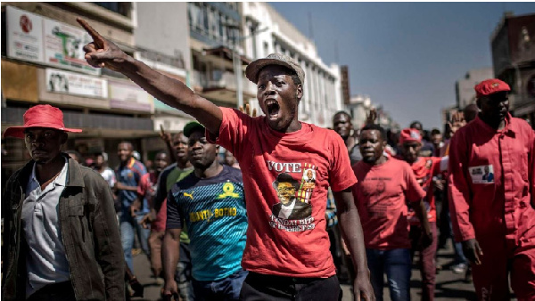 Supporters of the opposition party protest in the streets of Harare, Zimbabwe
