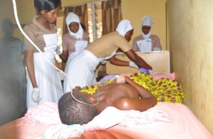 Meningitis patient receiving treatment in a health facility