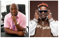 Kofi Abban (L) gifts Shatta Wale (R) a black Ferrari