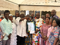 A retiree receiving a citation at the event