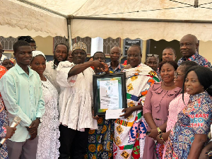 A retiree receiving a citation at the event