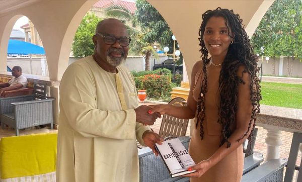 Dr Naa-Du Laryea with a member of the Ga Mantse, GaDangme Council