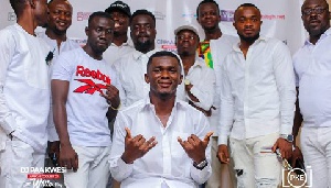 DJ Paa Kwesi with his friends at the party