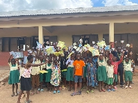 Some pupils of  Siriyiri Basic School show off their reading books