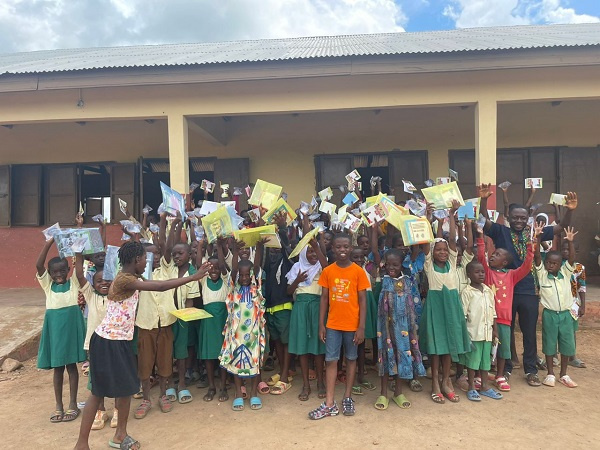 Some pupils of  Siriyiri Basic School show off their reading books