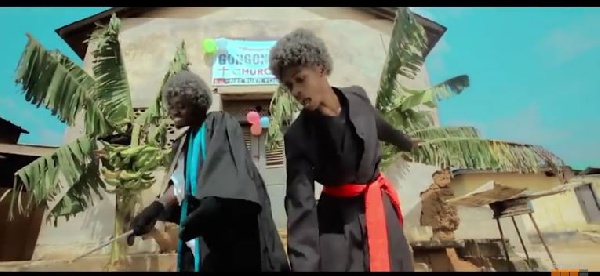 Young Chorus in 'MamaBossPapa' video