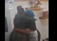 Lordina Mahama hugging Chef Faila in her kitchen on January 6, 2024