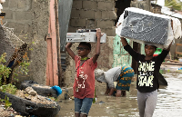 File photo of a family displaced by flood - Photo credit: Denis Onyodi / IFRC / DRK / Climate Centre