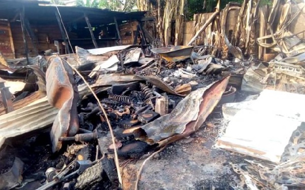 Properties destroyed include car engines, spare parts and mechanic tools