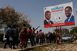 A billboard of then Senegalese presidential candidate Bassirou Diomaye Faye