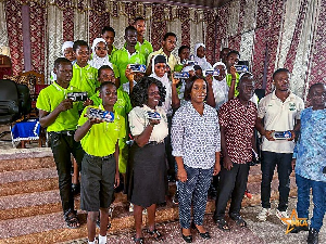 Laurette Korkor Asante with some teachers and students