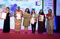 Sophia (second left) with her award citation