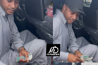 André Ayew was seen sharing cash to some young fans